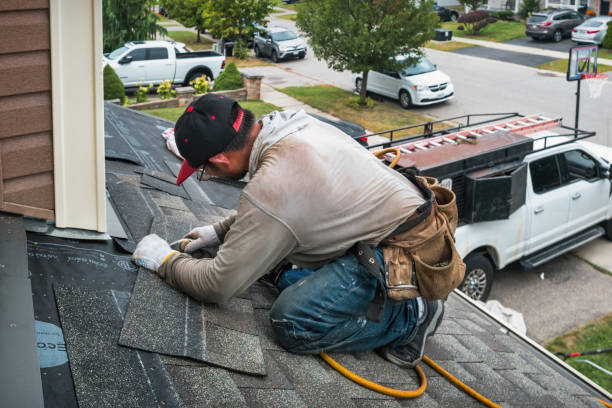 Professional Roofing technician working in Bozman, MD